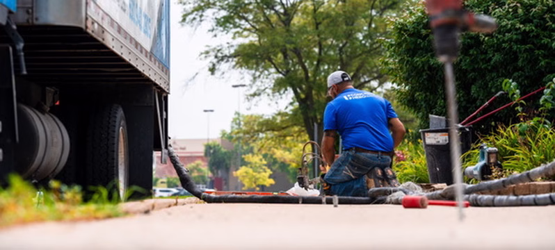 Photo taken by MCZ Productions, consisting of concrete hero employee lifting sunken slab in aurora.